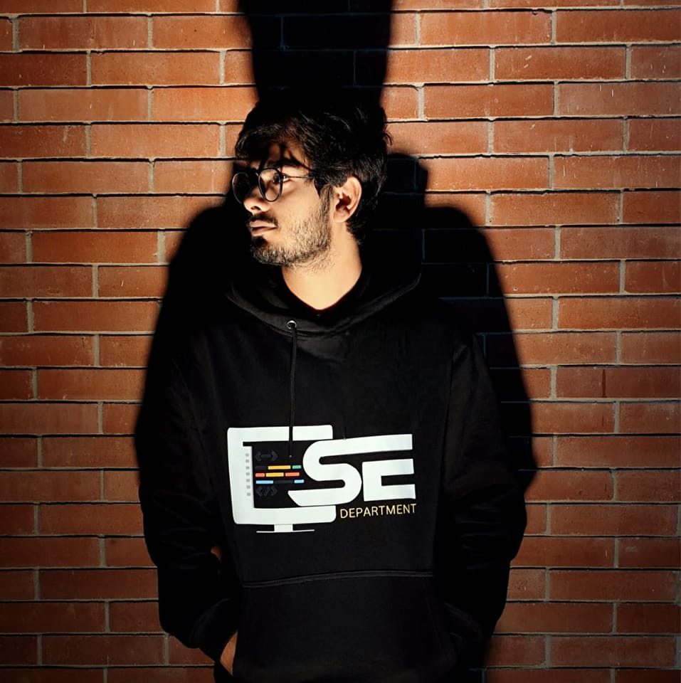 Chandan Chakrobortty wearing CSE Department hoodie — Computer Science graduate and systems engineer